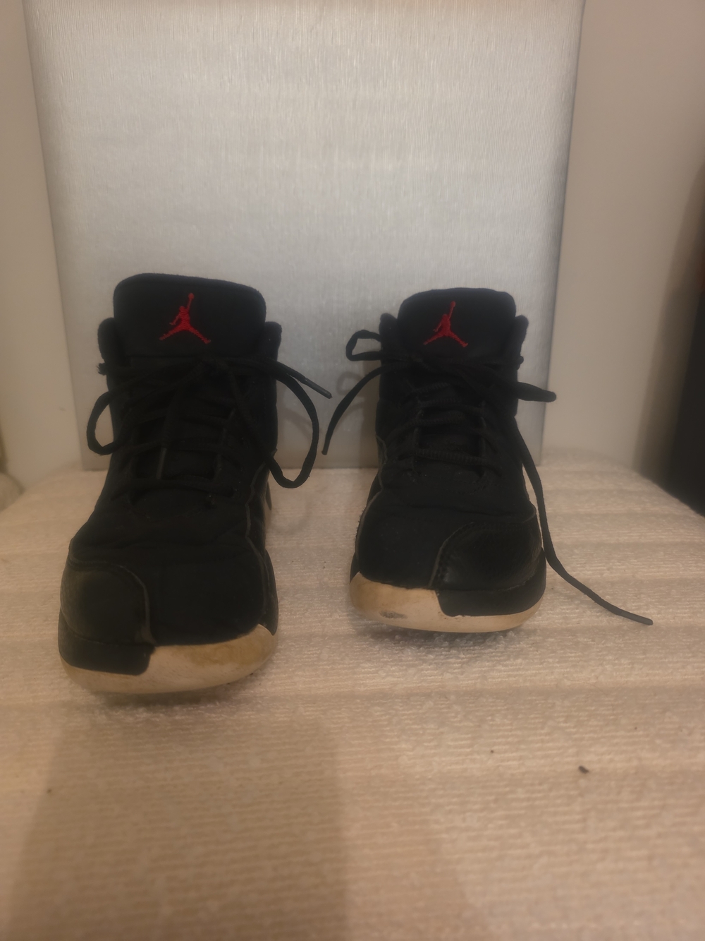 Jordan Black Sneakers with Red Jumpman Accent
